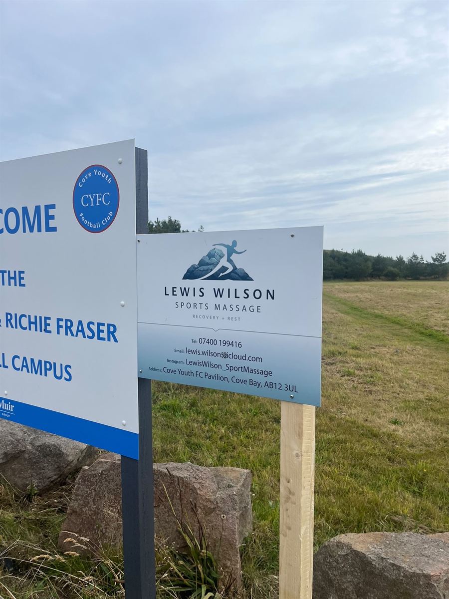 Lewis Wilson Sports Massage sign outside the Cove Youth FC campus